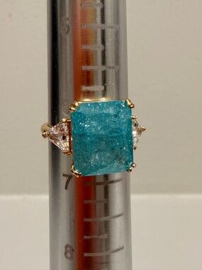Bomb Party! NWOT! Gold Ring with Teal Blue and Clear Trillion Side Stones